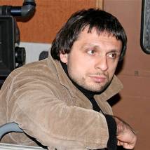 Олег Кохан на съемках фильма "Мелодия для шарманки" (© фото: Владимир Зинченко, "Сота Синема Групп")